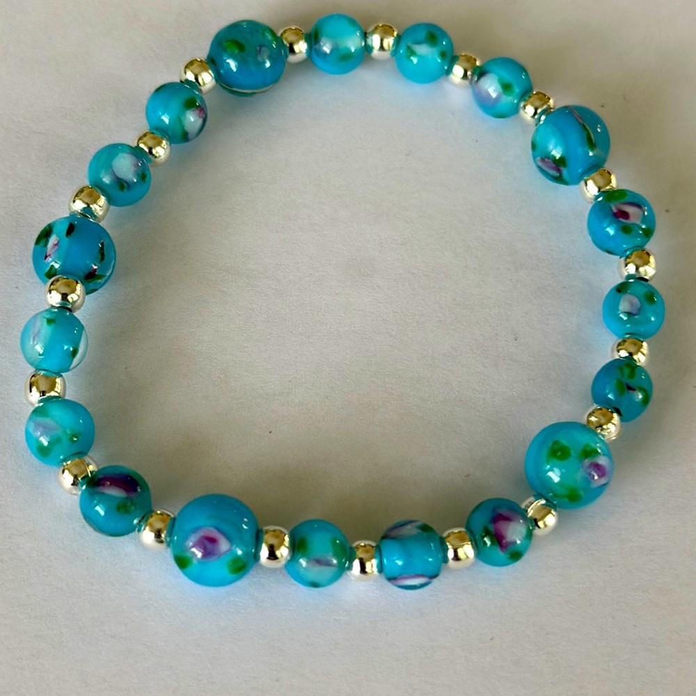 Beautiful Handmade Ladies Blue Beaded Bracelet with Silver inserts